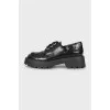 Leather oxfords with decorative hardware