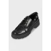 Leather oxfords with decorative hardware