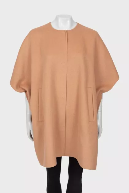 Beige poncho with press-studs closure 