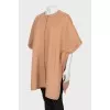 Beige poncho with press-studs closure 