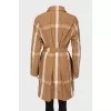 Beige checkered raincoat