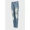 Blue jeans with ripped effect