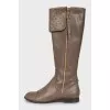 Leather boots with golden zippers