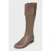Leather boots with golden zippers