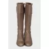 Leather boots with golden zippers