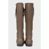 Leather boots with golden zippers