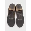 Leather boots with golden zippers