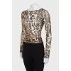 Translucent top in animal print