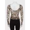 Translucent top in animal print