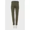 Khaki jeans with raw hem