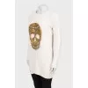 Wool sweater with skull decor