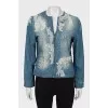 Denim jacket decorated with lace