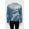 Denim jacket decorated with lace