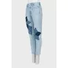 Light blue jeans with patches