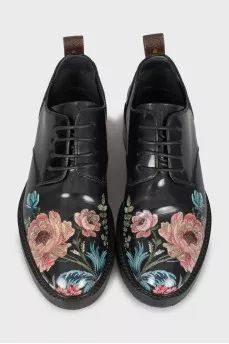 Printed patent leather boots