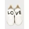 Leather sneakers with decor