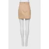 Beige skirt with pockets
