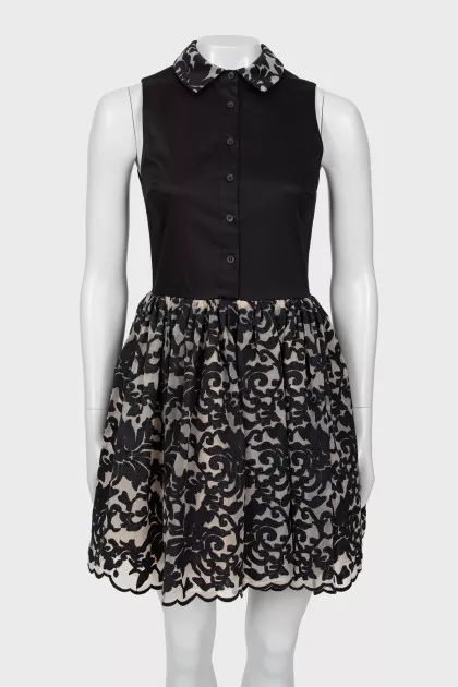 Black dress with a patterned hem