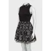 Black dress with a patterned hem