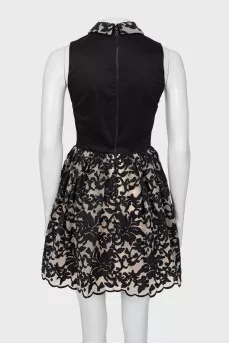 Black dress with a patterned hem