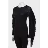 Black sweater with fringed sleeves
