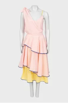Dress with perforations and frills