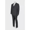 Men's wool suit with stripes and tag