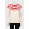 Milky sweater with red pattern
