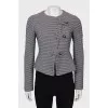 Fitted jacket with bias fastening