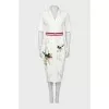 White dress with a pattern on the hem