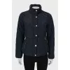 Navy blue jacket with gold hardware
