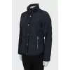 Navy blue jacket with gold hardware