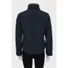 Navy blue jacket with gold hardware