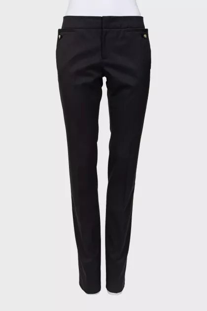 Wool trousers with decorated buttons