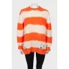 Knitted sweater with ripped effect