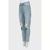 Ripped effect embellished jeans