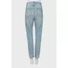 Ripped effect embellished jeans