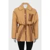 Short fur coat with a belt