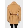 Short fur coat with a belt