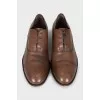 Men's shoes decorated with laces