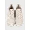 Light gray suede sneakers
