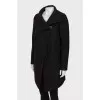 Wool coat with bias fastening