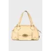 Beige bag with gold hardware