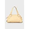 Beige bag with gold hardware
