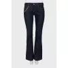 Flared jeans decorated with chain