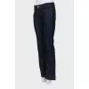 Flared jeans decorated with chain