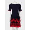 Knitted dress of combined color