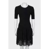 Black dress with woven hem