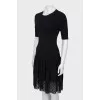 Black dress with woven hem