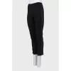 Black leggings decorated with stripes